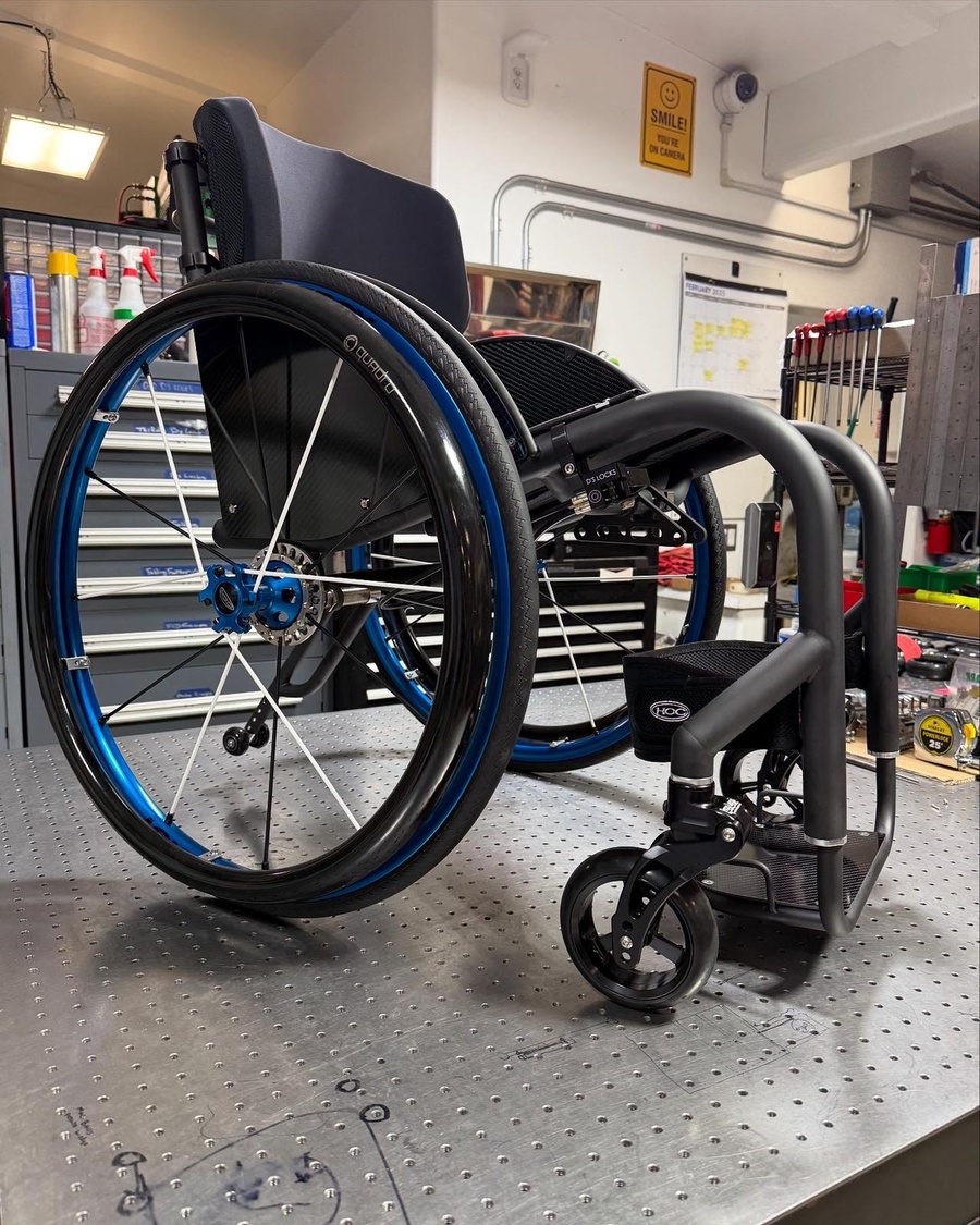 A custom HOC wheelchair configured around its rider.
