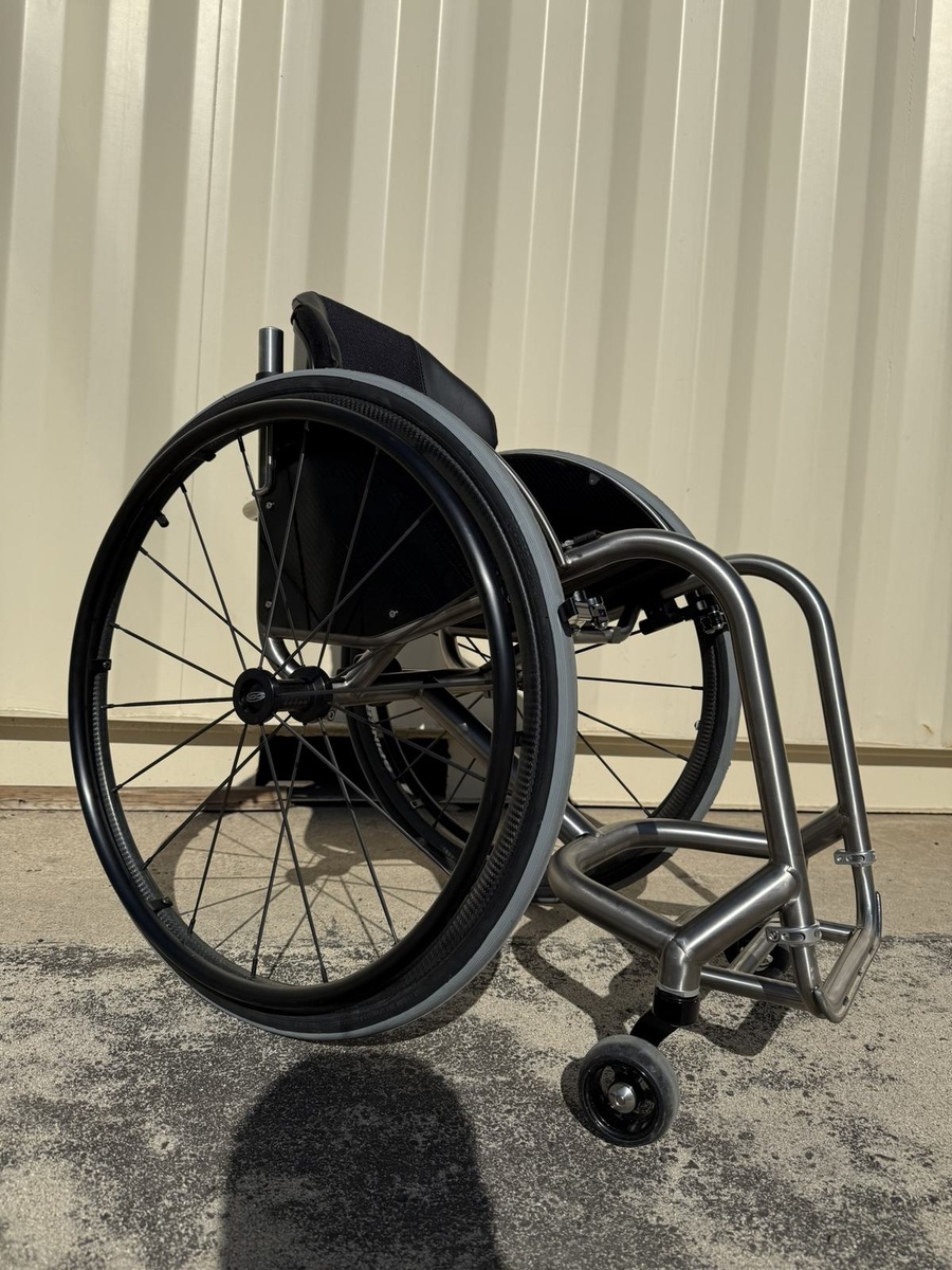 A custom HOC wheelchair configured around its rider.