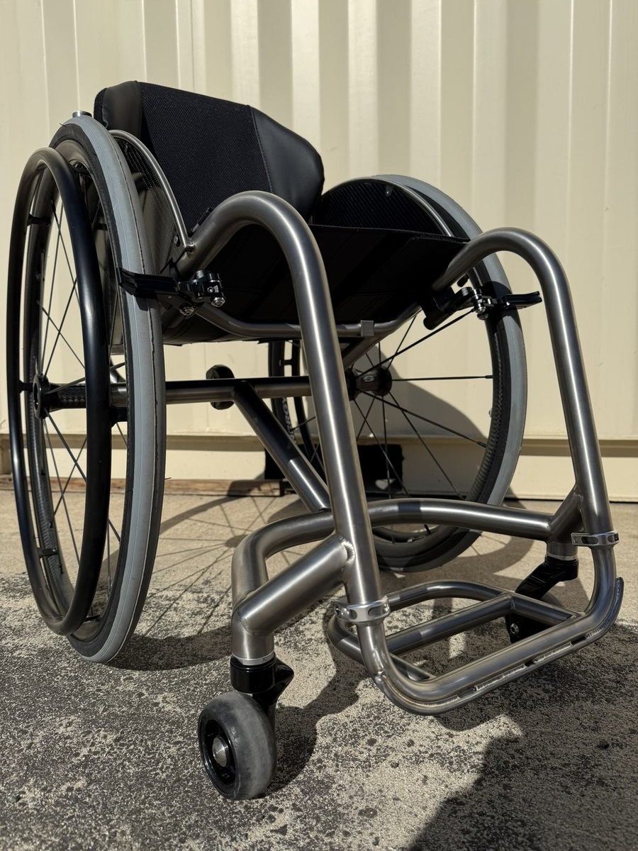 A custom HOC wheelchair configured around its rider.