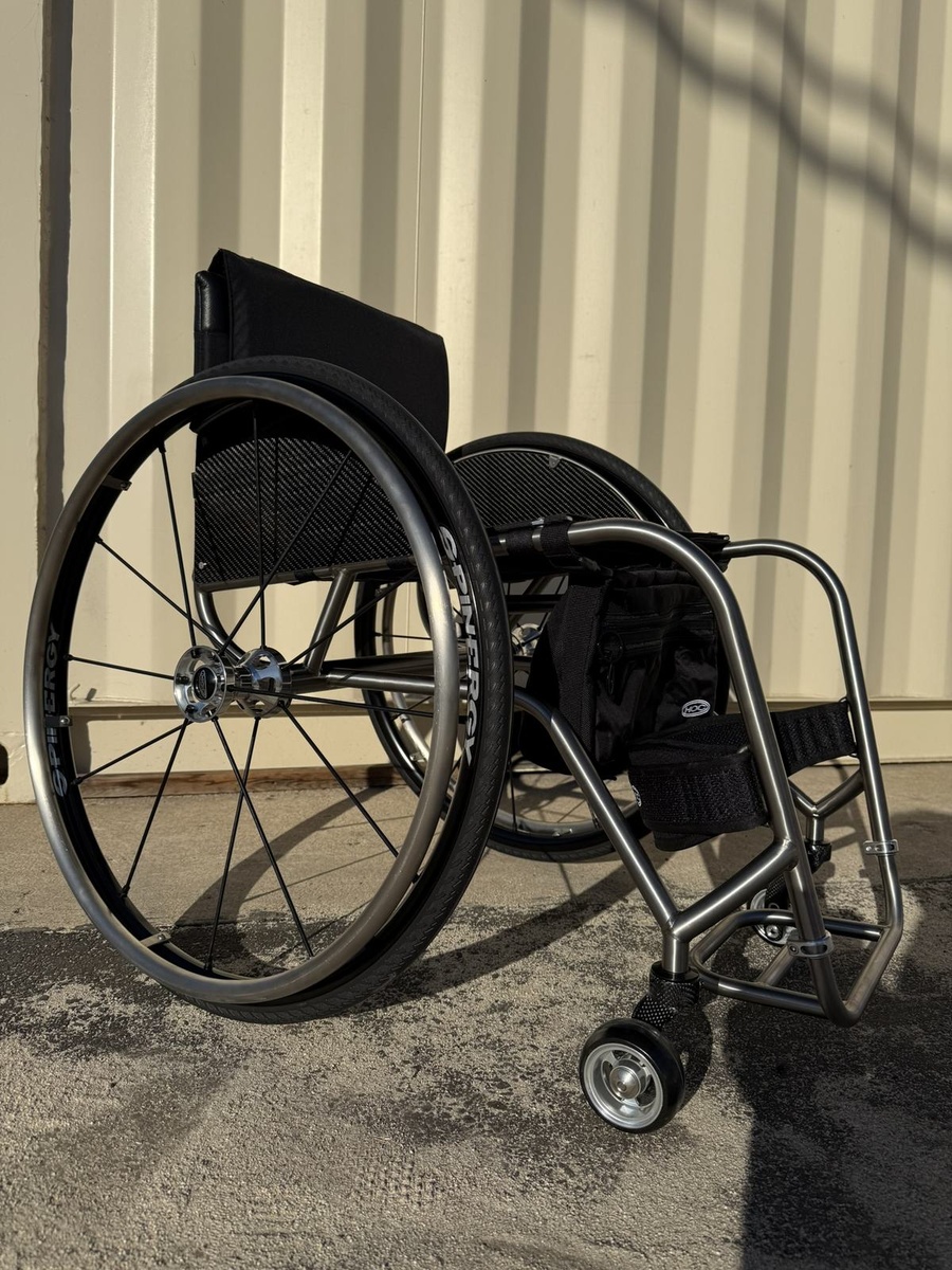 A custom HOC wheelchair configured around its rider.