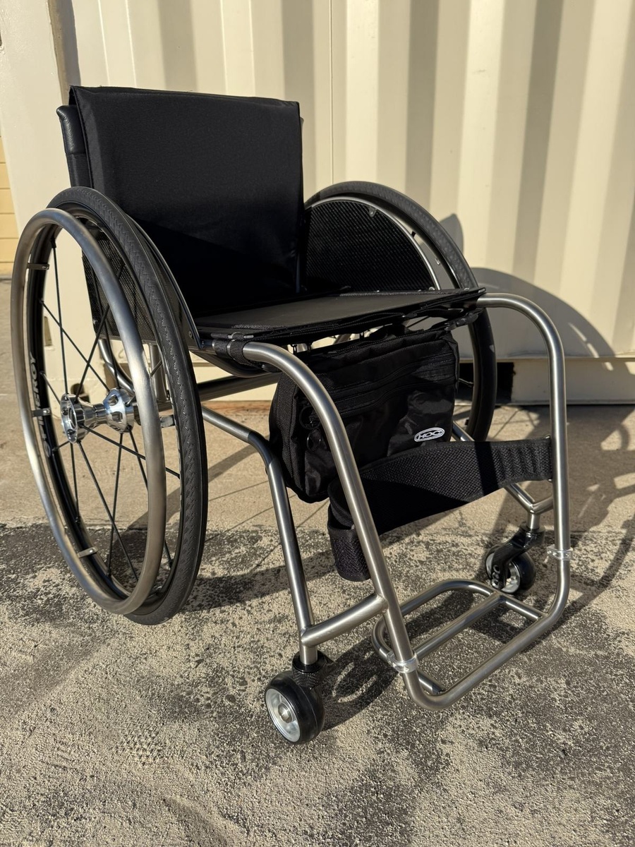 A custom HOC wheelchair configured around its rider.