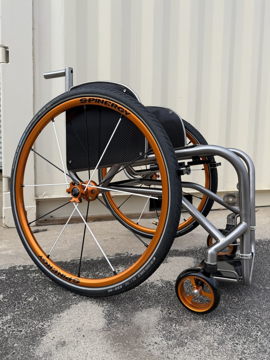 A custom HOC wheelchair configured around its rider.