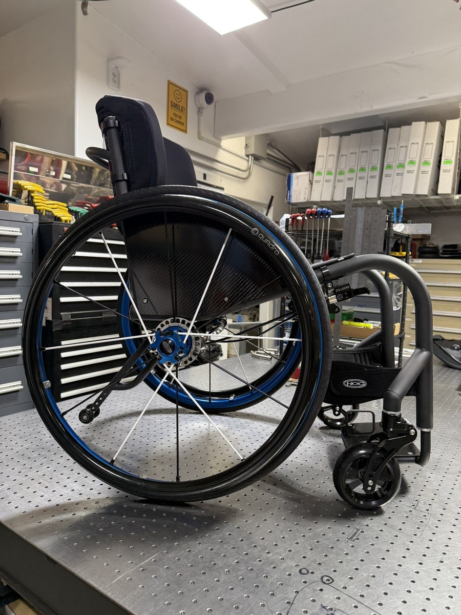 A custom HOC wheelchair configured around its rider.