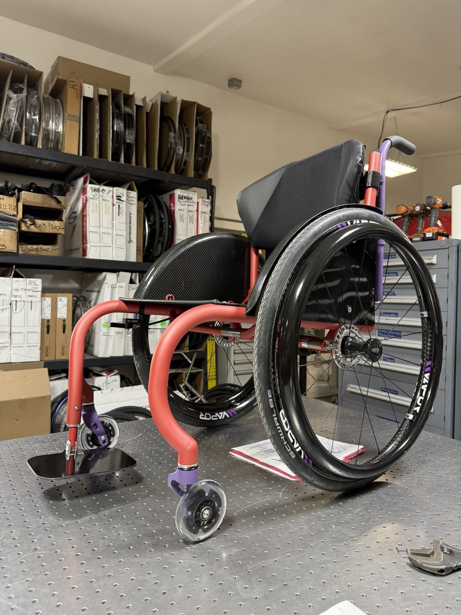 A custom HOC wheelchair configured around its rider.