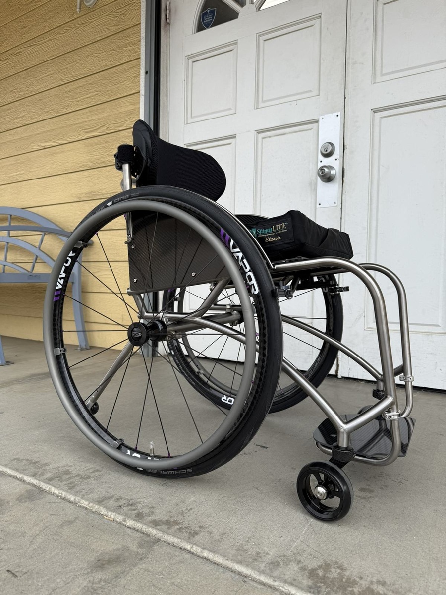 A custom HOC wheelchair configured around its rider.