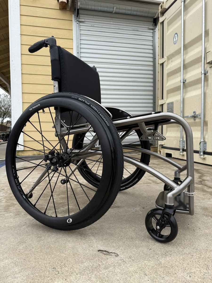 A custom HOC wheelchair configured around its rider.