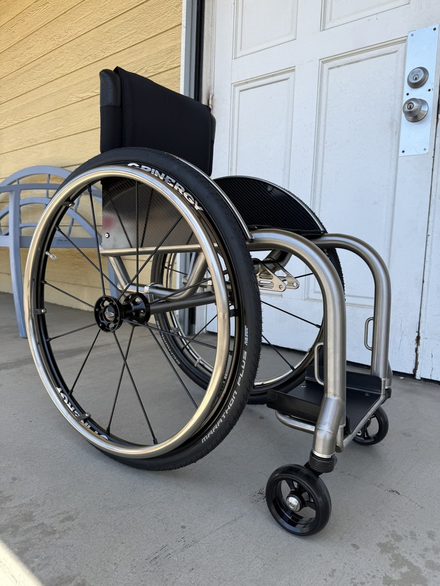 A custom HOC wheelchair configured around its rider.