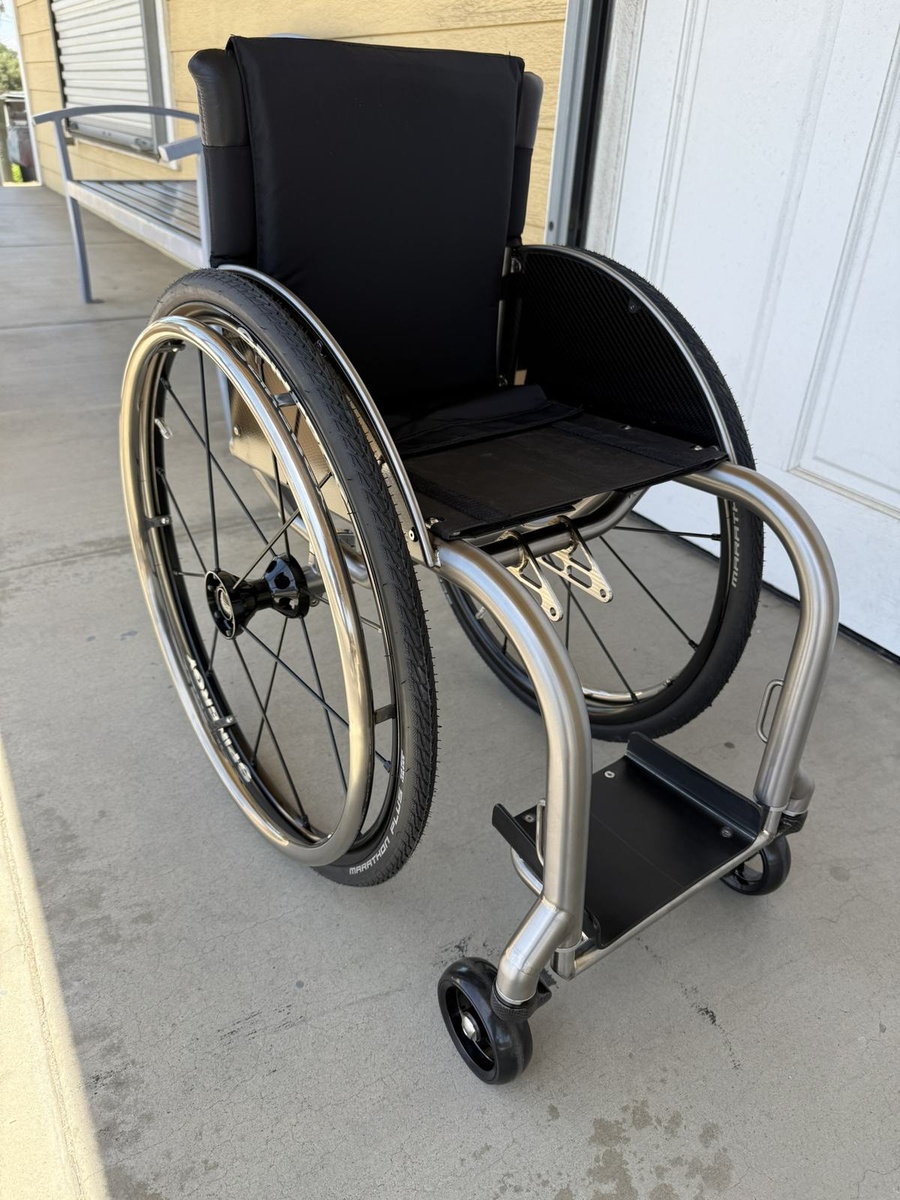 A custom HOC wheelchair configured around its rider.