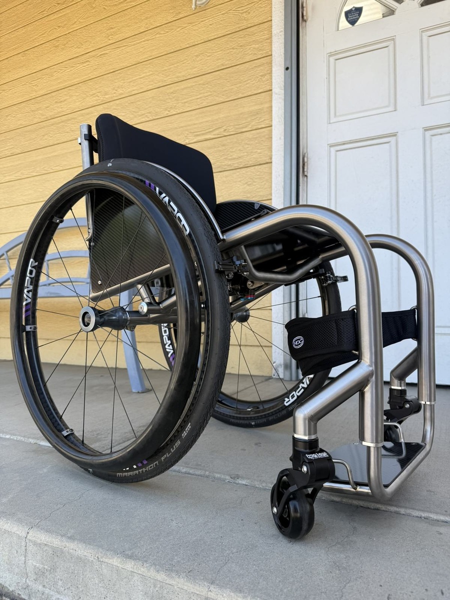 A custom HOC wheelchair configured around its rider.