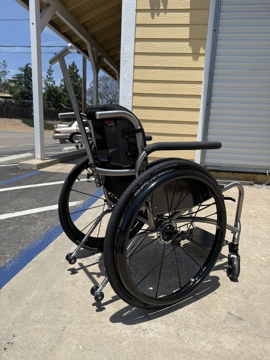 A custom HOC wheelchair configured around its rider.