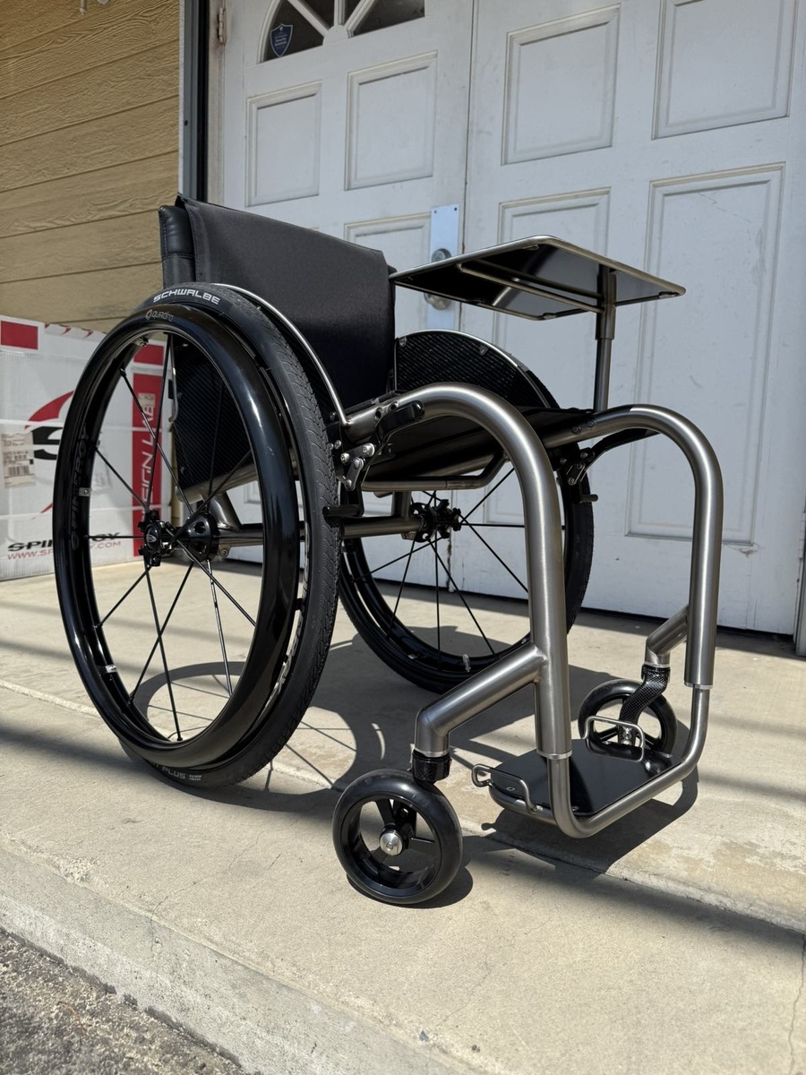 A custom HOC wheelchair configured around its rider.