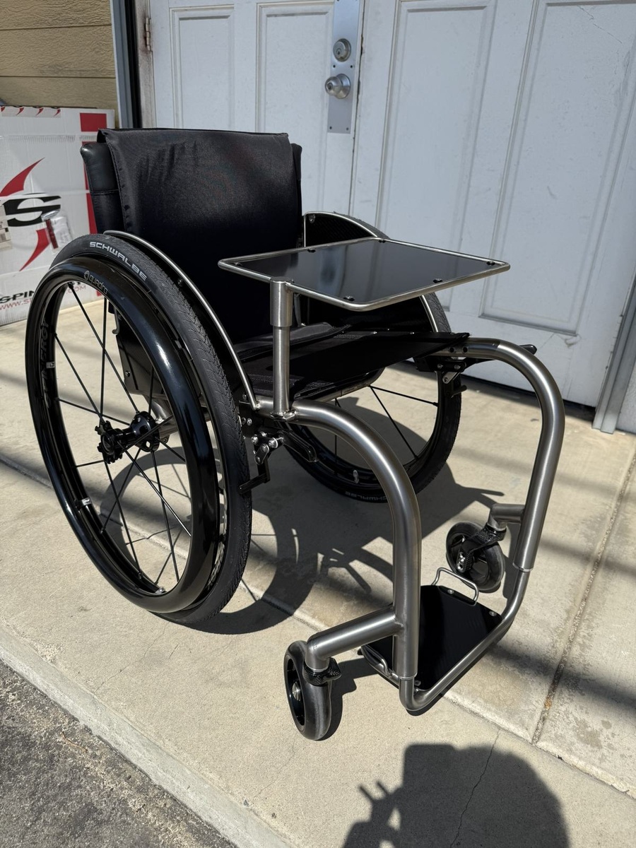 A custom HOC wheelchair configured around its rider.