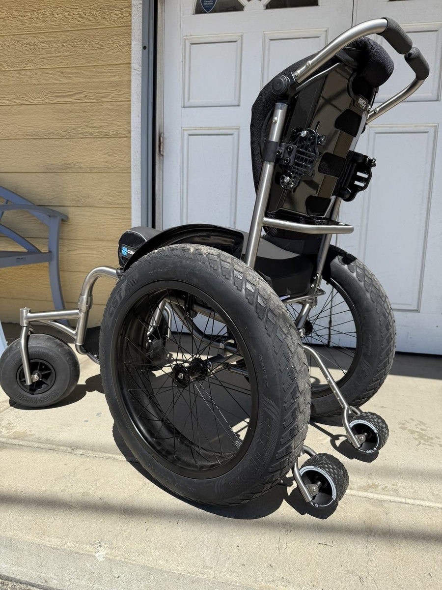 An HOC wheelchair configured for power assist or rough terrain.
