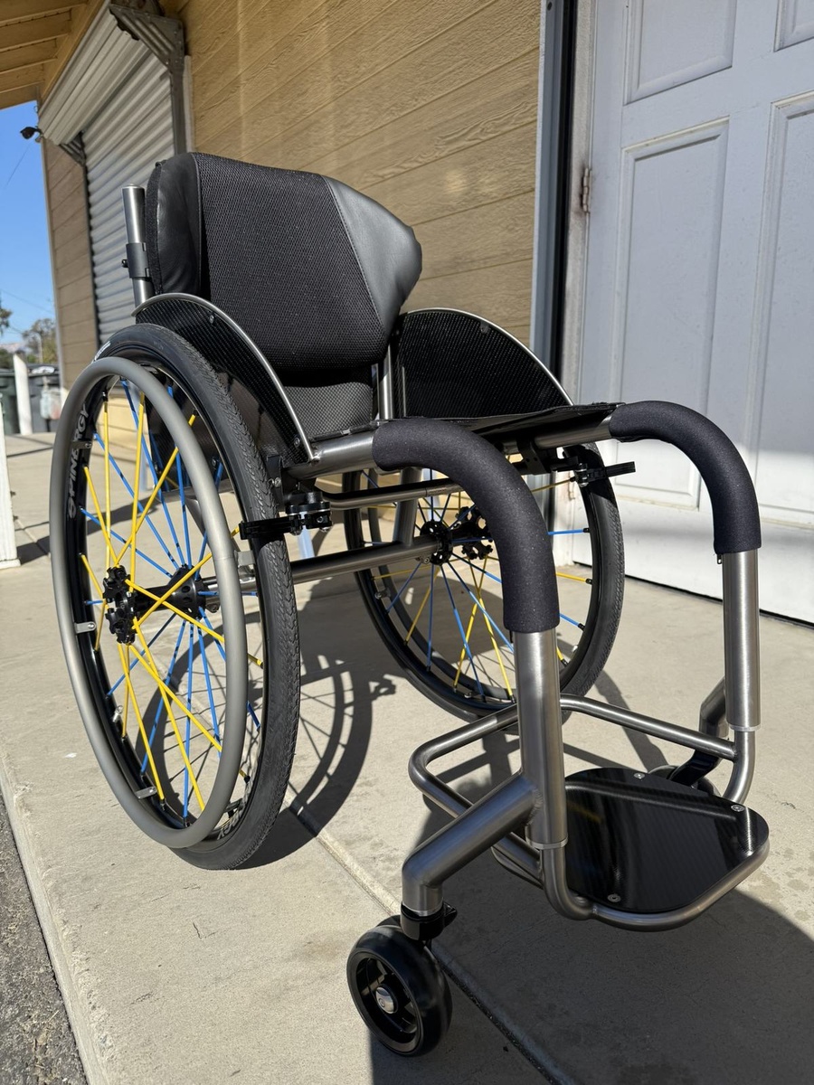 A custom HOC wheelchair configured around its rider.