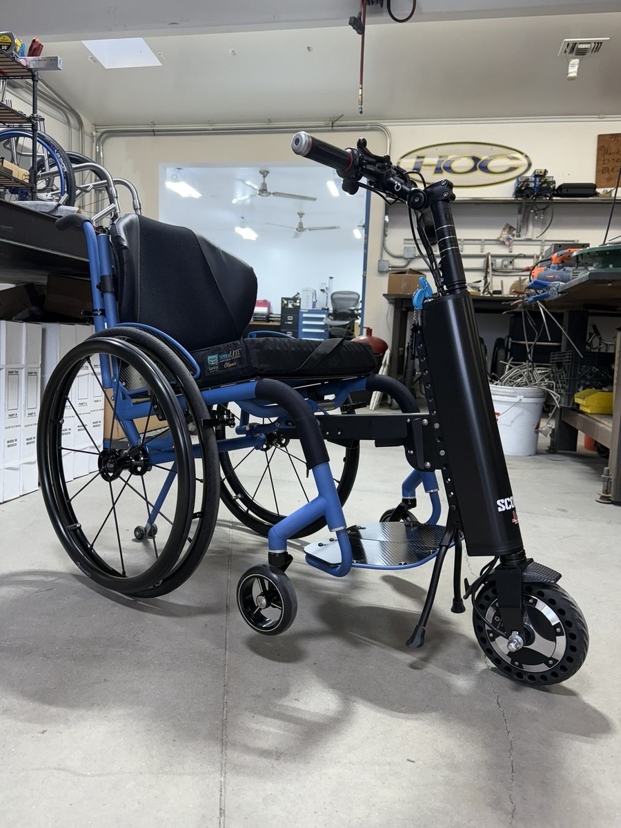 A custom HOC wheelchair configured around its rider.