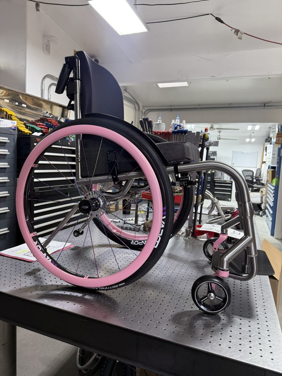 A custom HOC wheelchair configured around its rider.