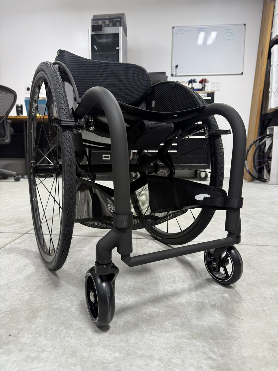 A custom HOC wheelchair configured around its rider.