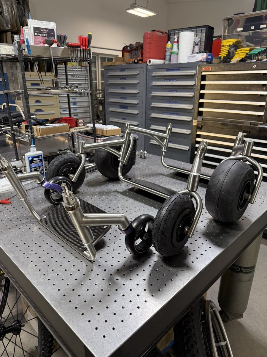 A travel-ready HOC wheelchair with folding or coupler features.