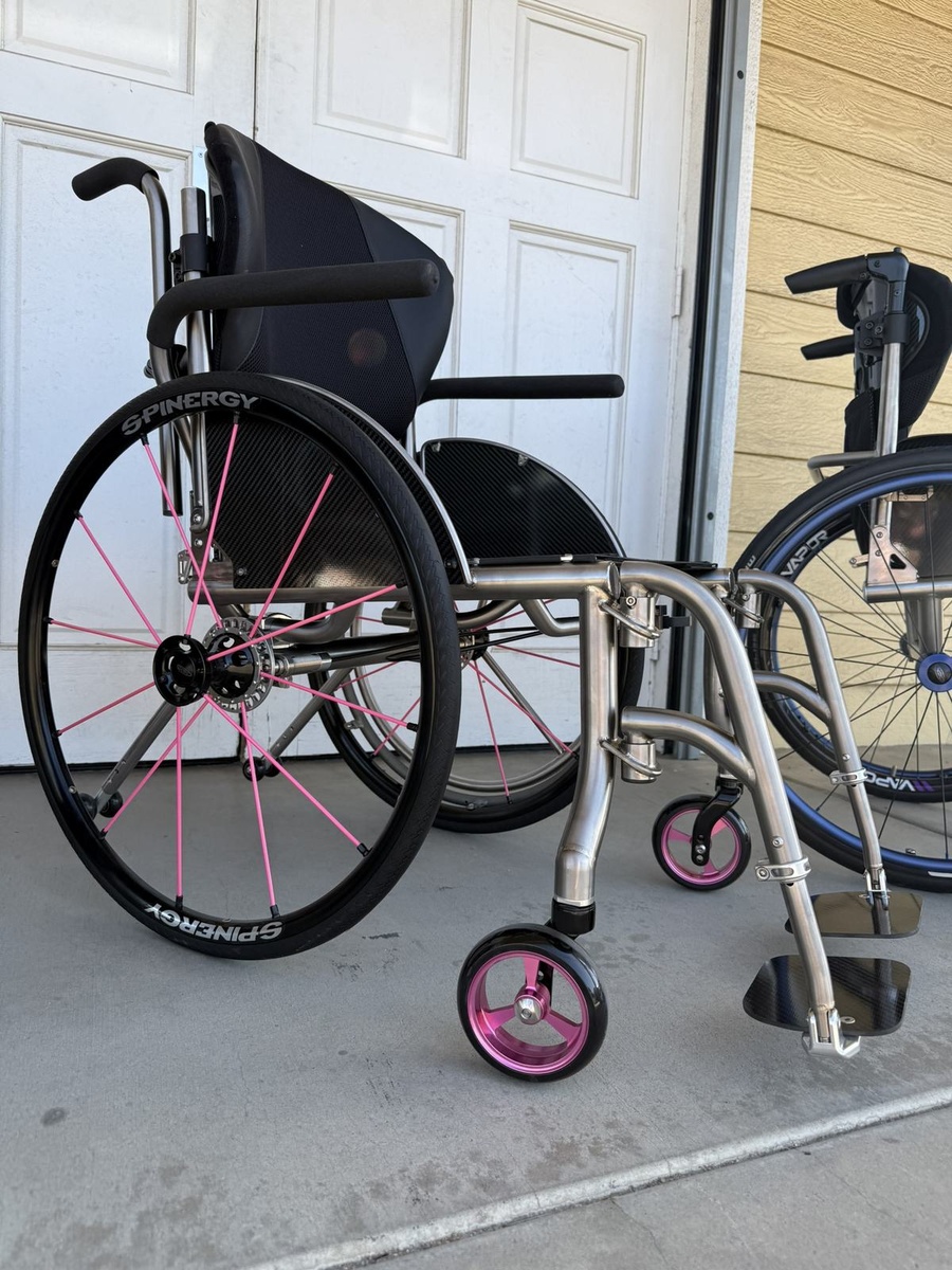 A custom HOC wheelchair configured around its rider.
