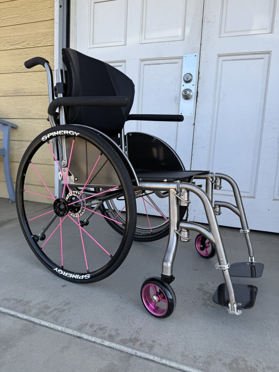 A custom HOC wheelchair configured around its rider.