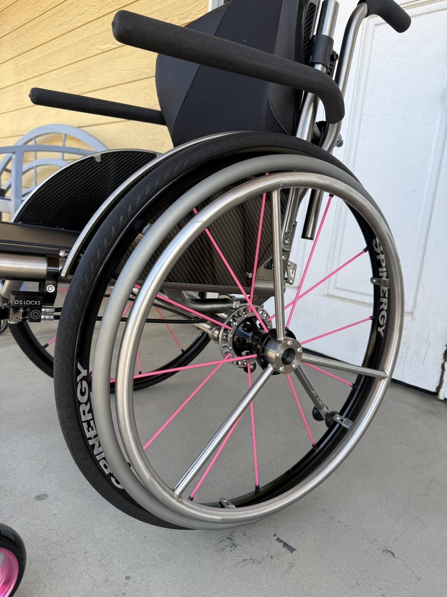 A custom HOC wheelchair configured around its rider.