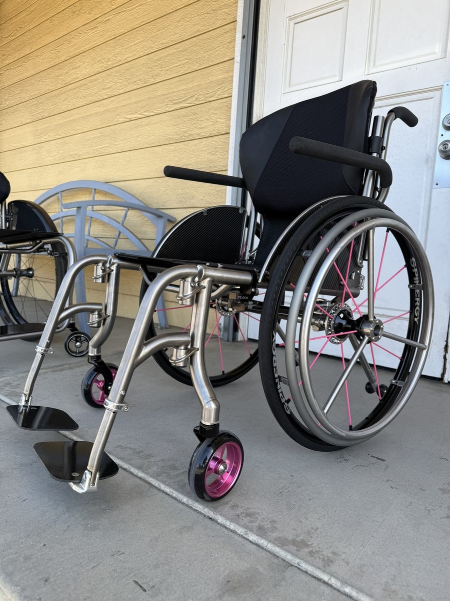 A custom HOC wheelchair configured around its rider.