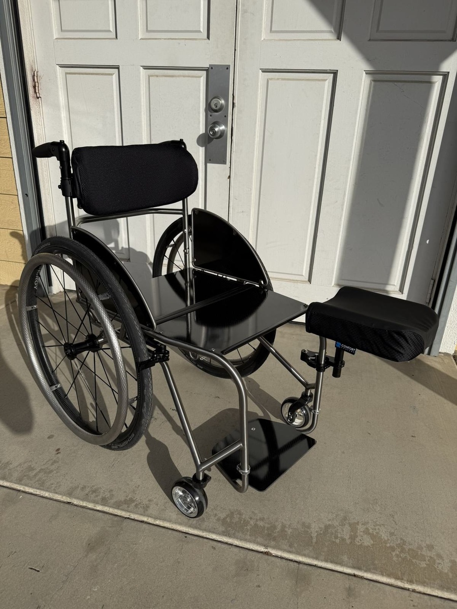 A custom HOC wheelchair configured around its rider.