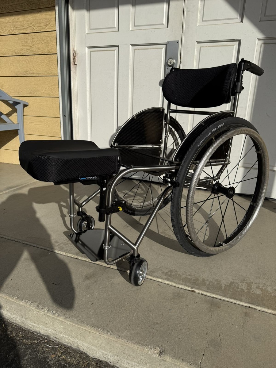 A custom HOC wheelchair configured around its rider.