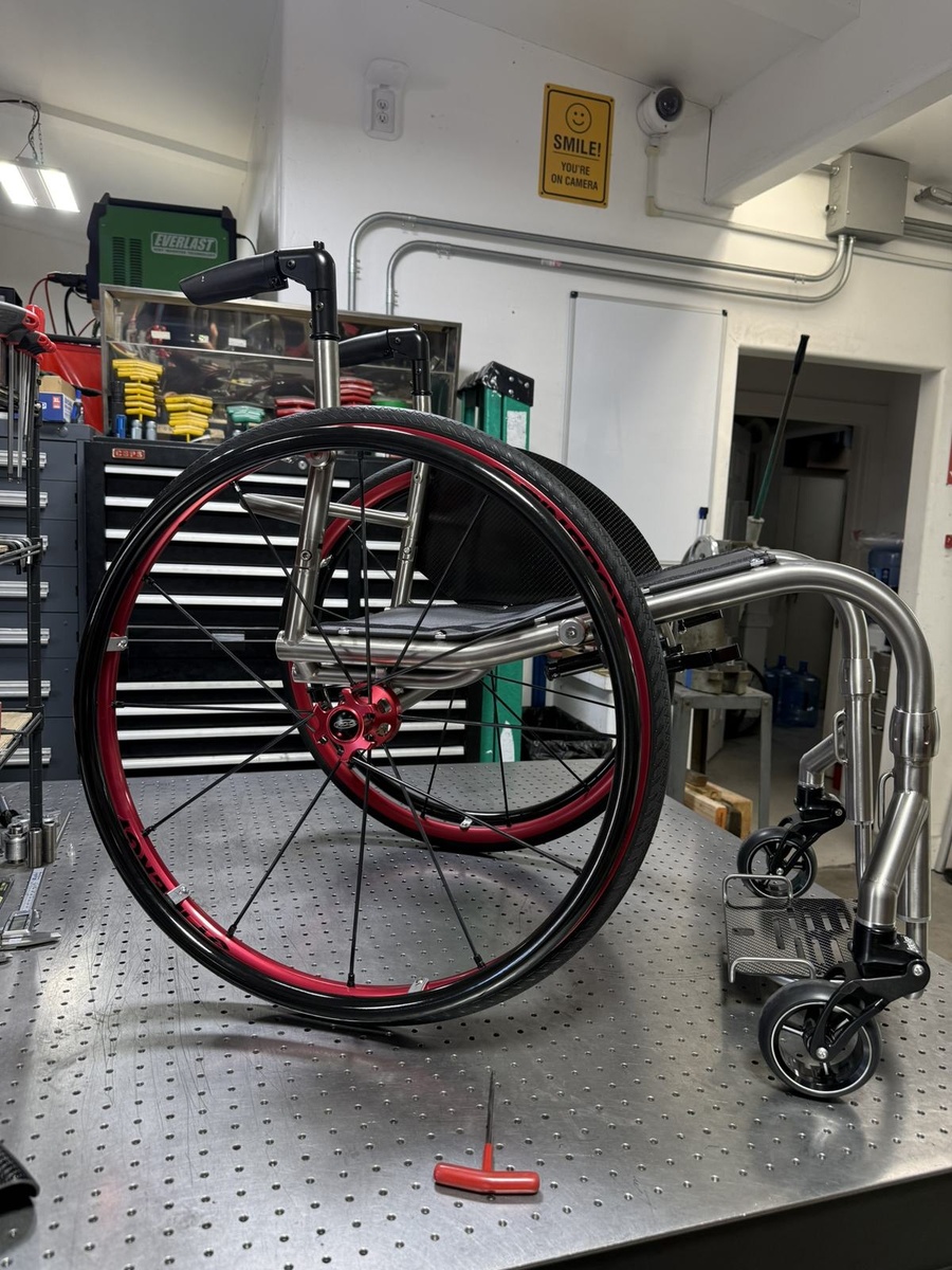 A custom HOC wheelchair configured around its rider.