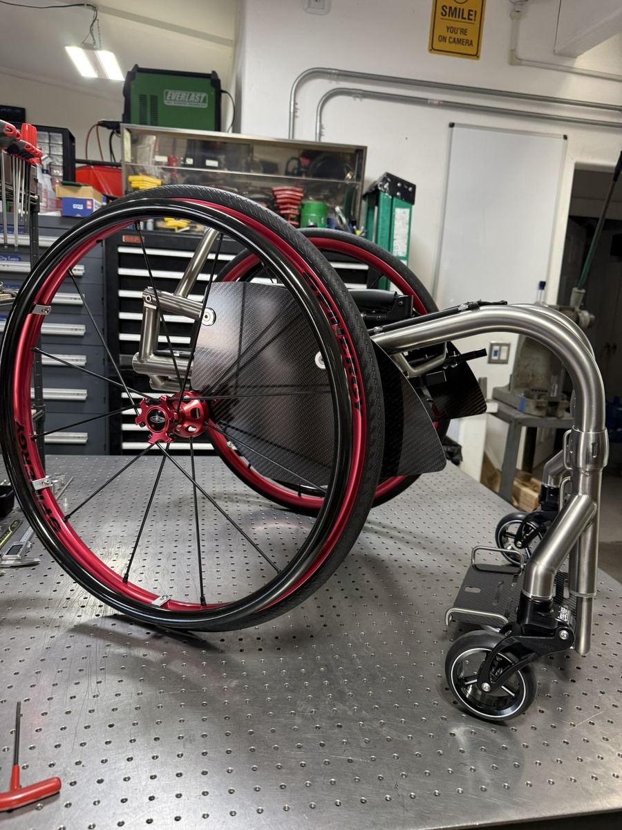 A custom HOC wheelchair configured around its rider.