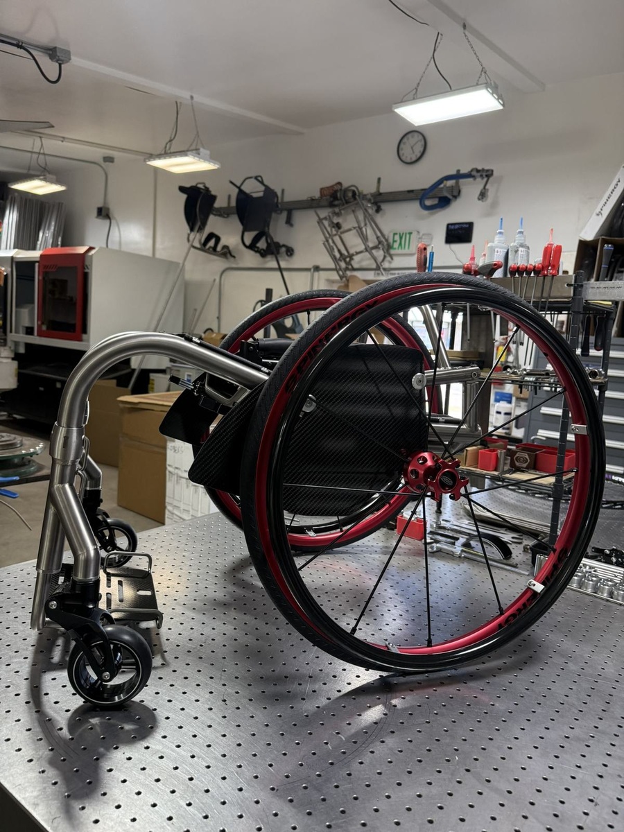 A custom HOC wheelchair configured around its rider.