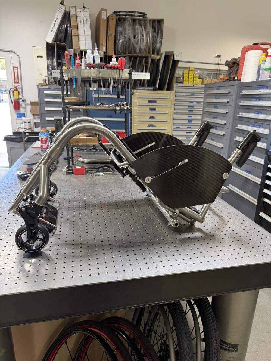 A custom HOC wheelchair configured around its rider.