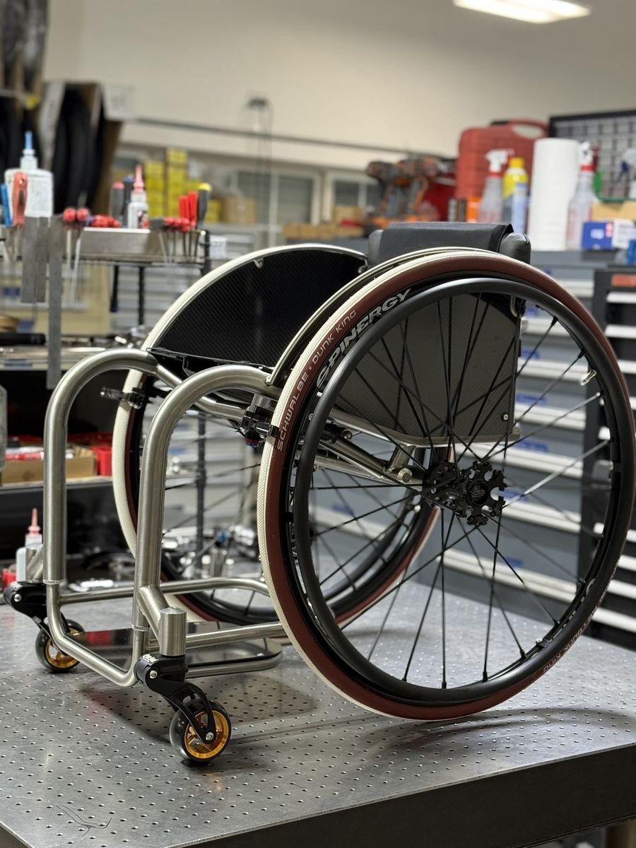 A custom HOC wheelchair configured around its rider.