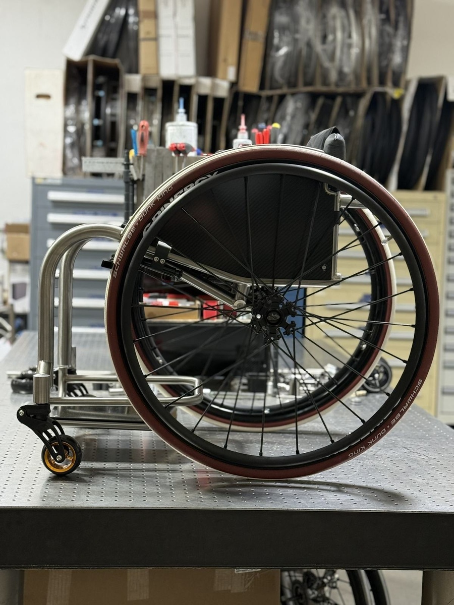 A custom HOC wheelchair configured around its rider.
