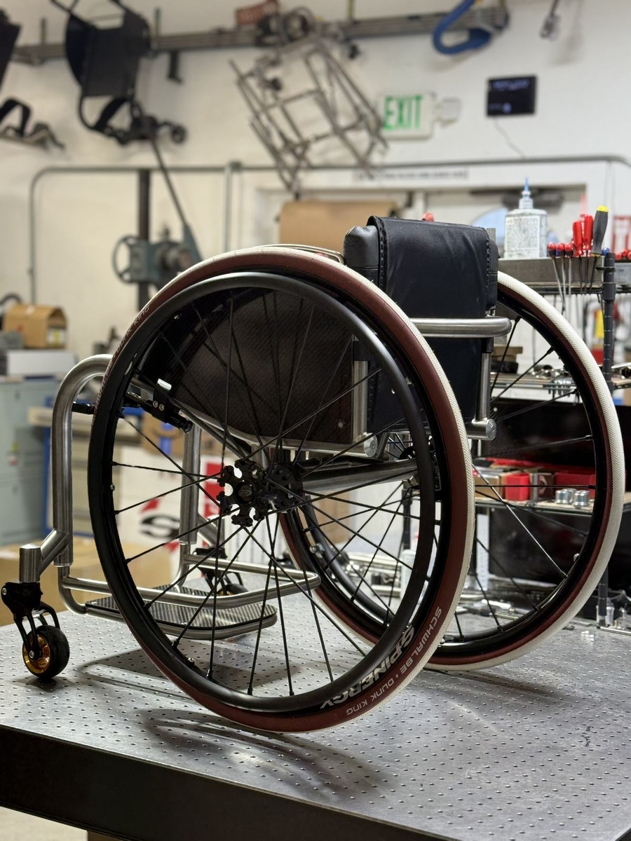 A custom HOC wheelchair configured around its rider.