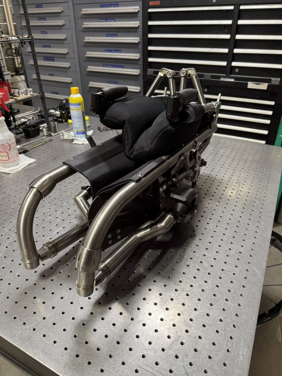A travel-ready HOC wheelchair with folding or coupler features.