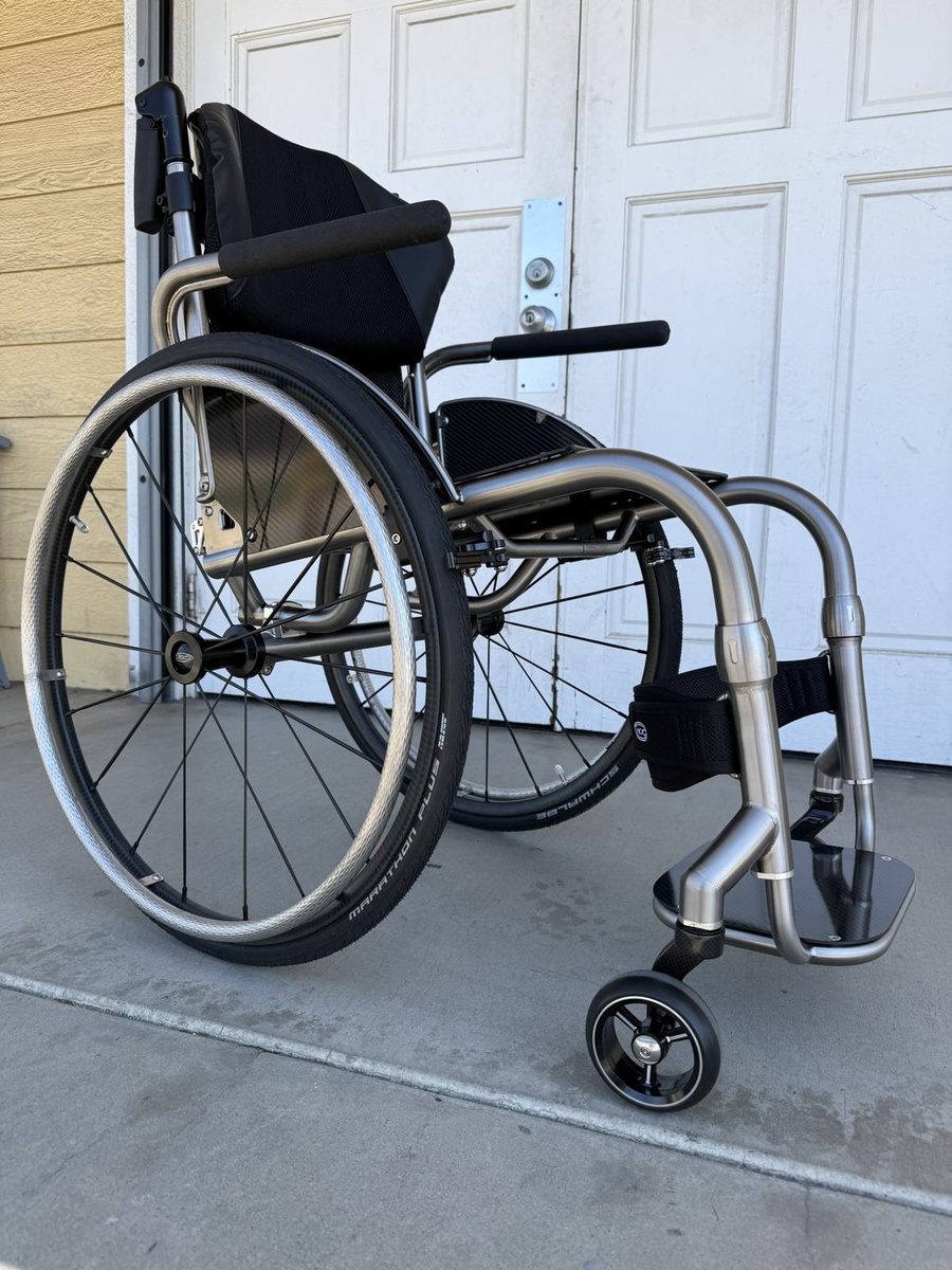 A custom HOC wheelchair configured around its rider.