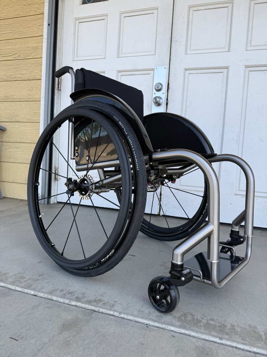 A custom HOC wheelchair configured around its rider.