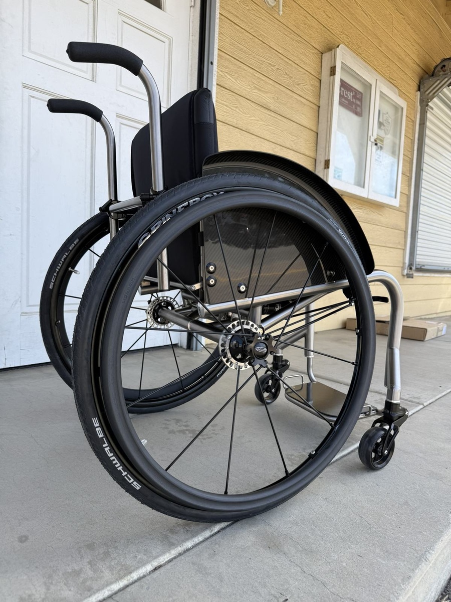A custom HOC wheelchair configured around its rider.