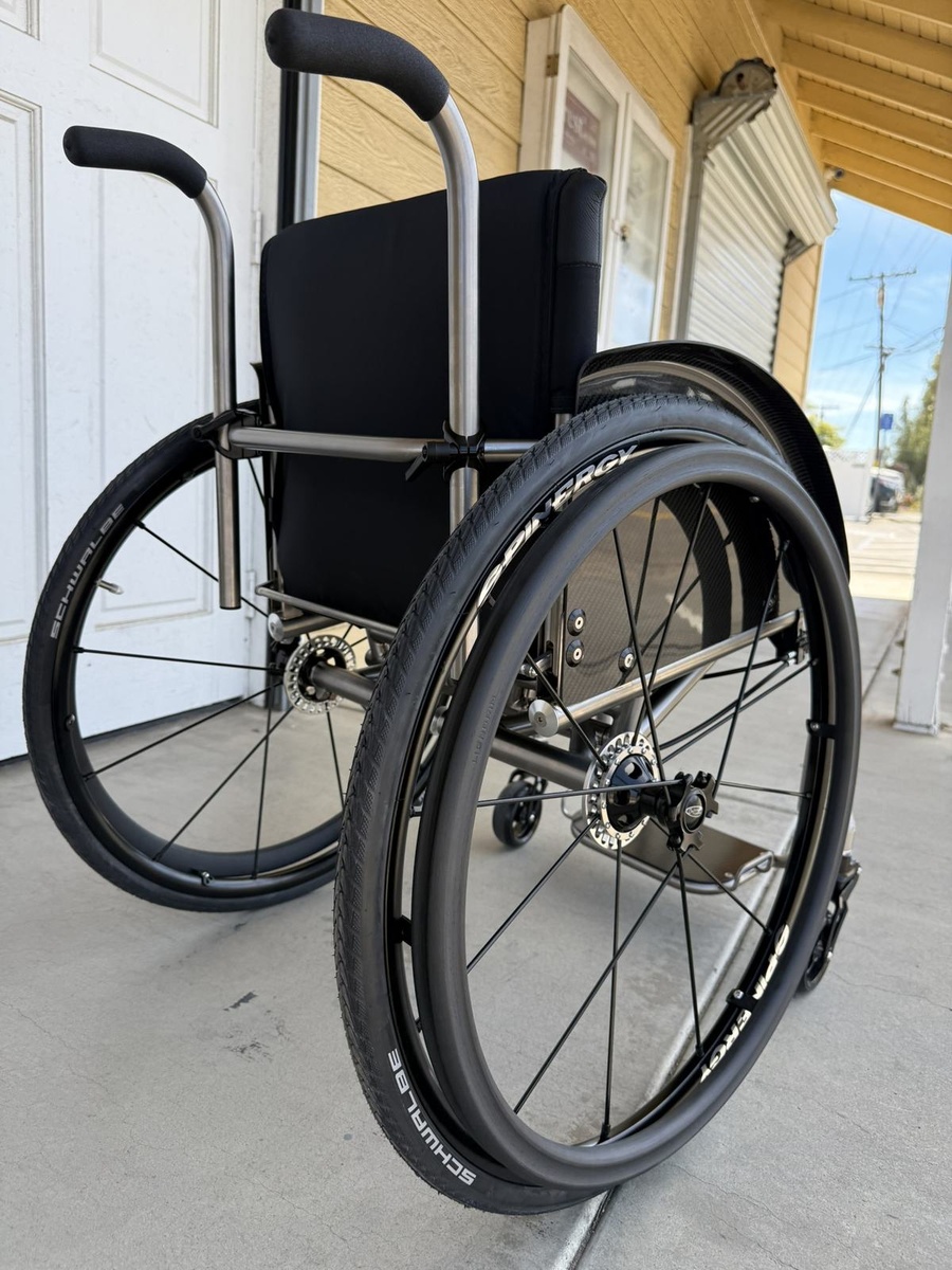 A custom HOC wheelchair configured around its rider.