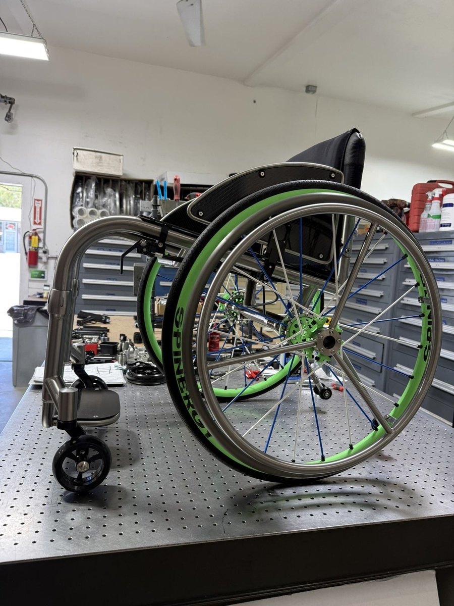 A custom HOC wheelchair configured around its rider.