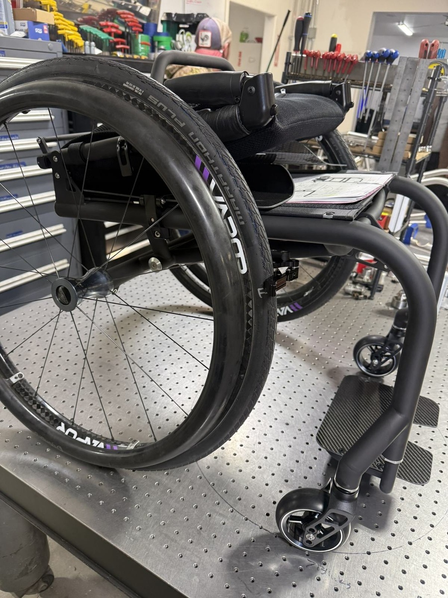 A custom HOC wheelchair configured around its rider.