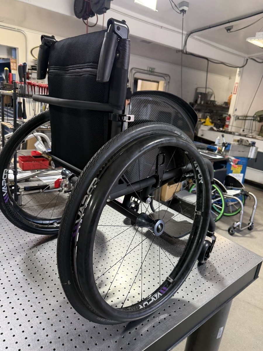 A custom HOC wheelchair configured around its rider.