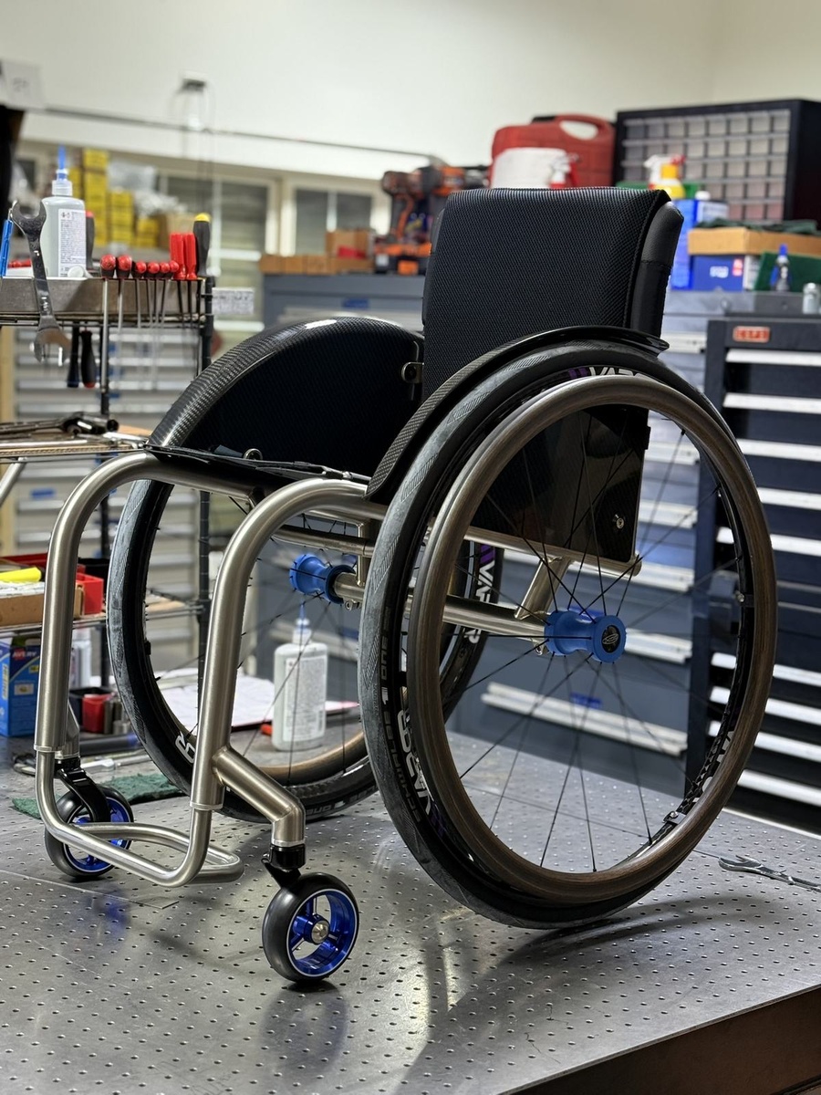 A custom HOC wheelchair configured around its rider.