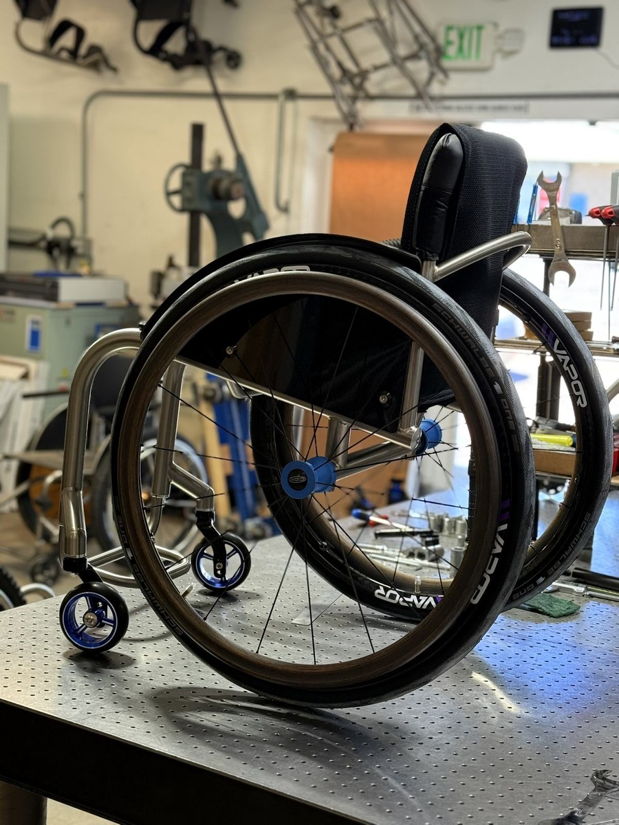 A custom HOC wheelchair configured around its rider.