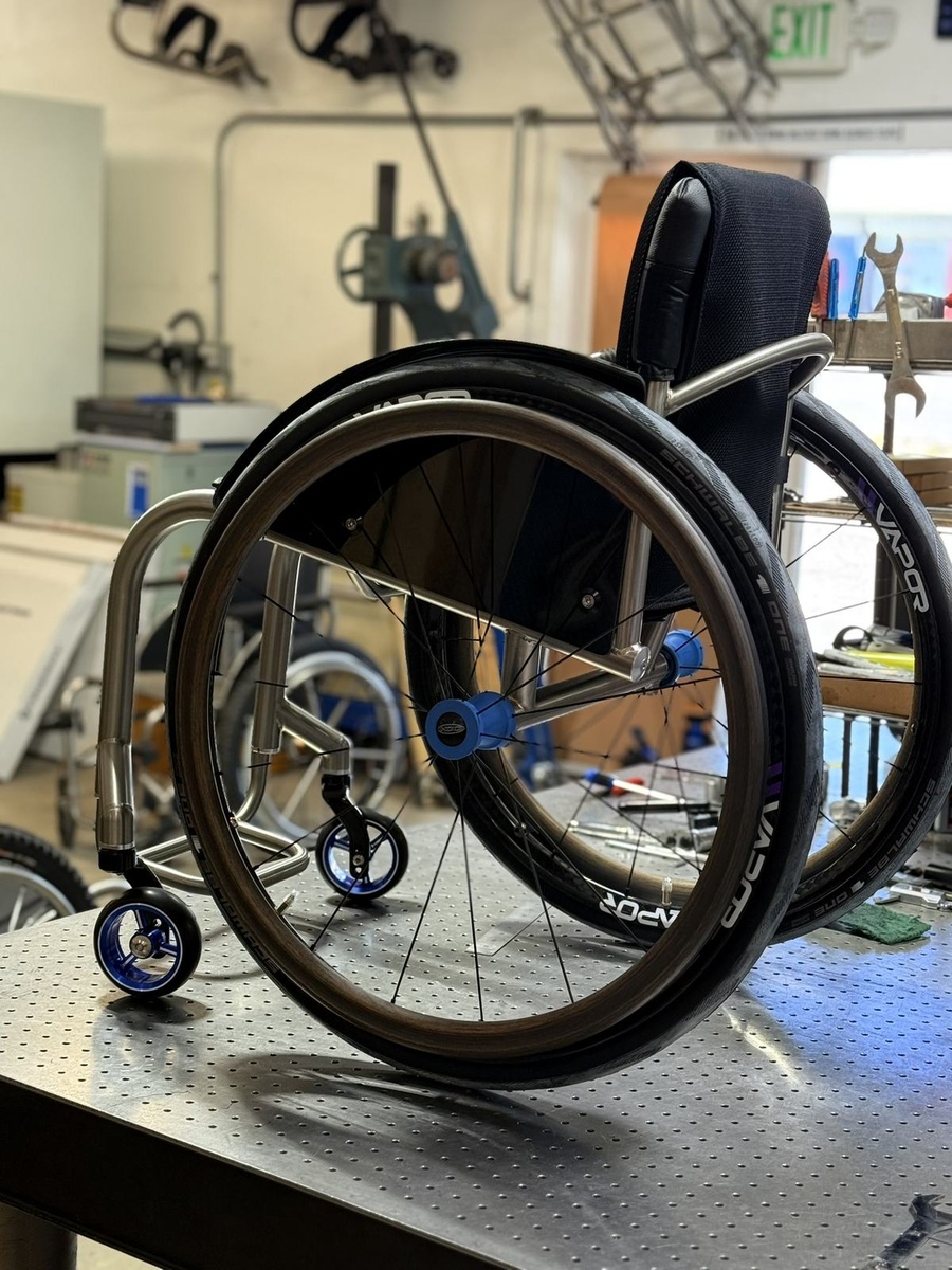 A custom HOC wheelchair configured around its rider.
