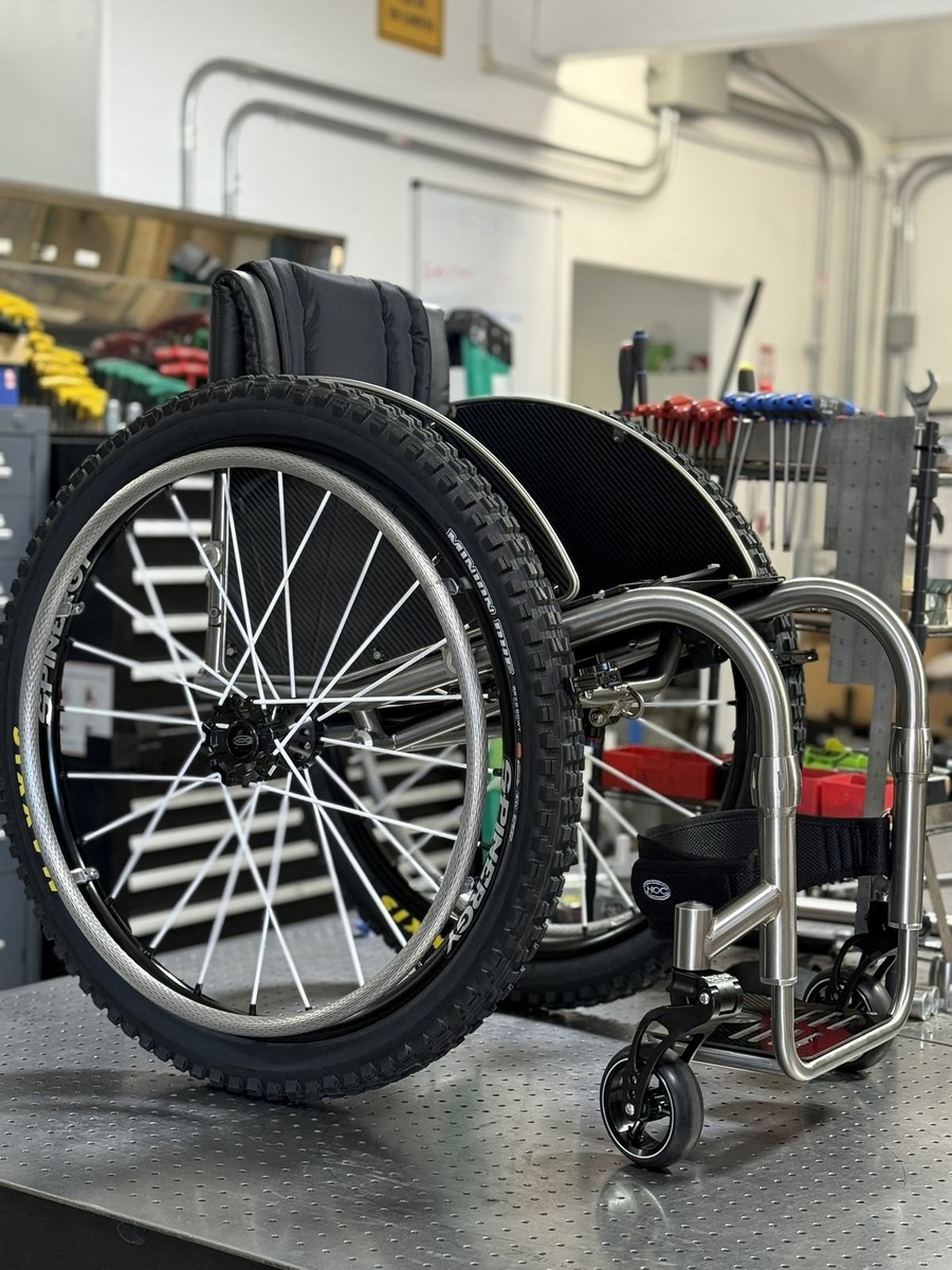 An HOC wheelchair configured for power assist or rough terrain.