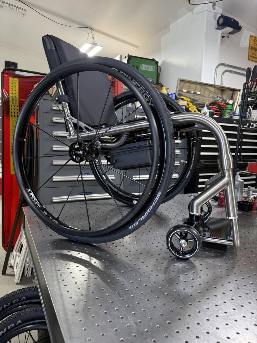 A custom HOC wheelchair configured around its rider.