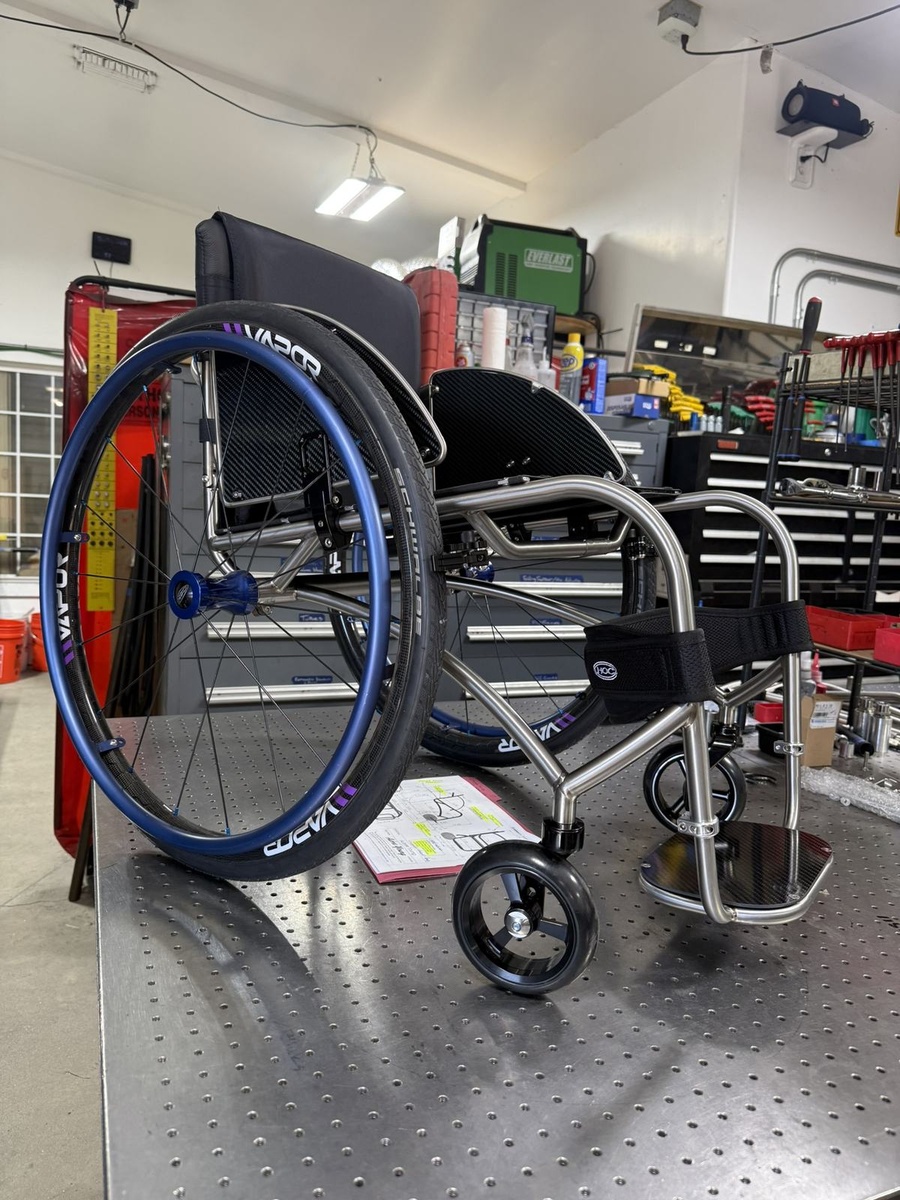 A custom HOC wheelchair configured around its rider.