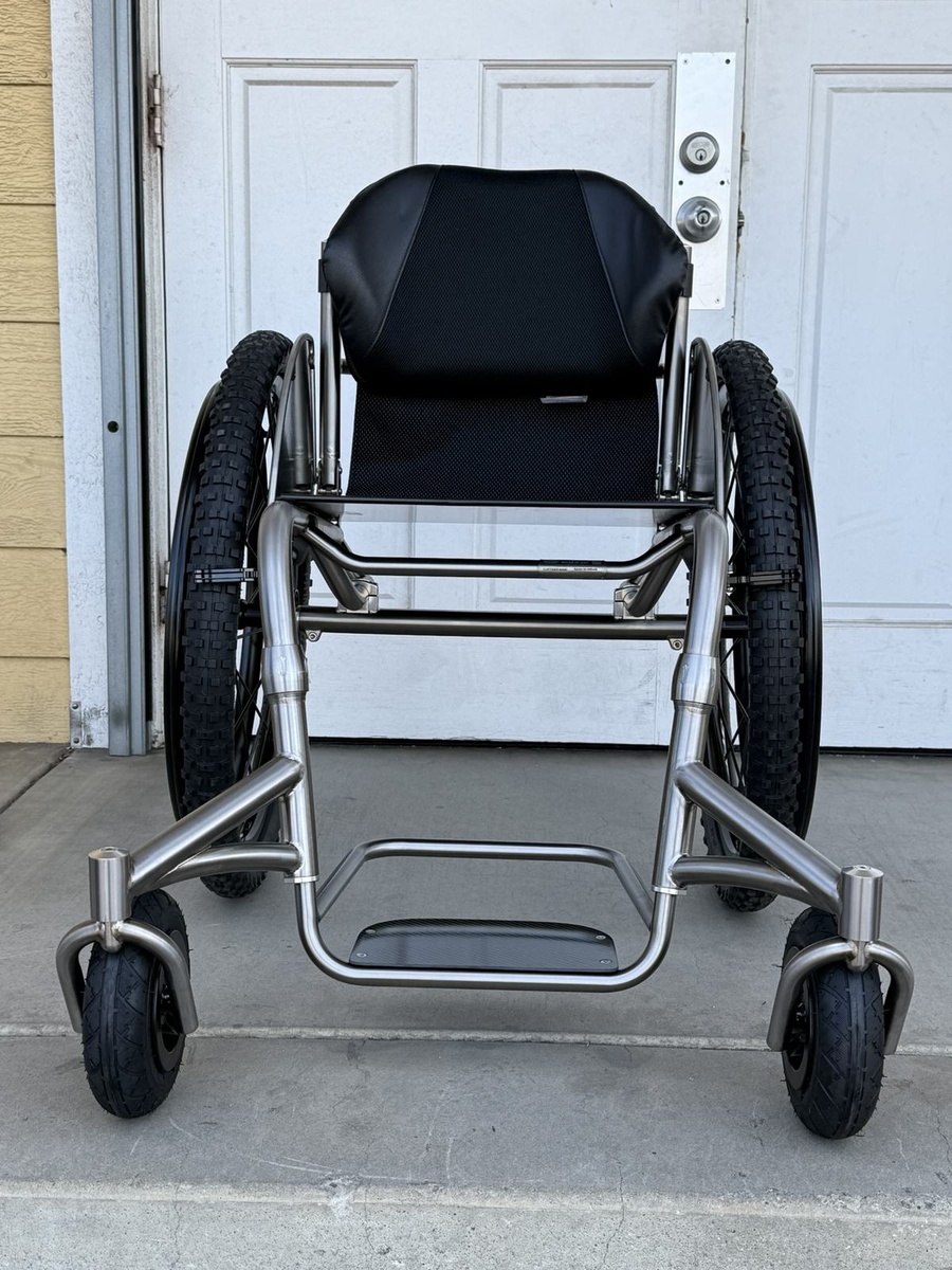 An HOC wheelchair configured for power assist or rough terrain.
